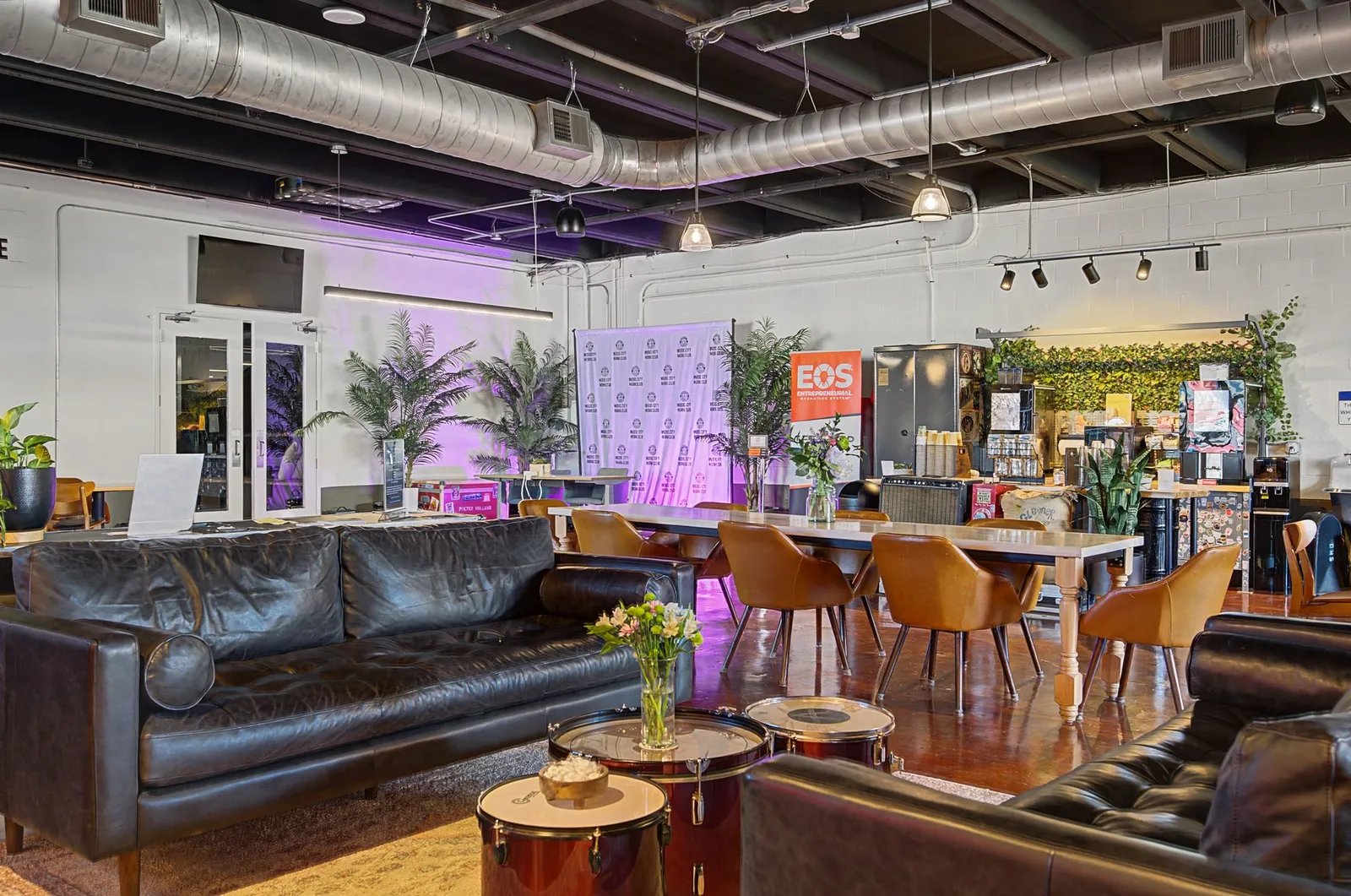 Lounge seating and bar area inside the Nashville event space at Music City Work Club